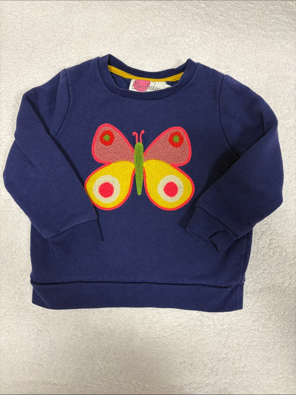 Mini Boden Navy Sweatshirt with Bright Butterfly Applique girls 3/4